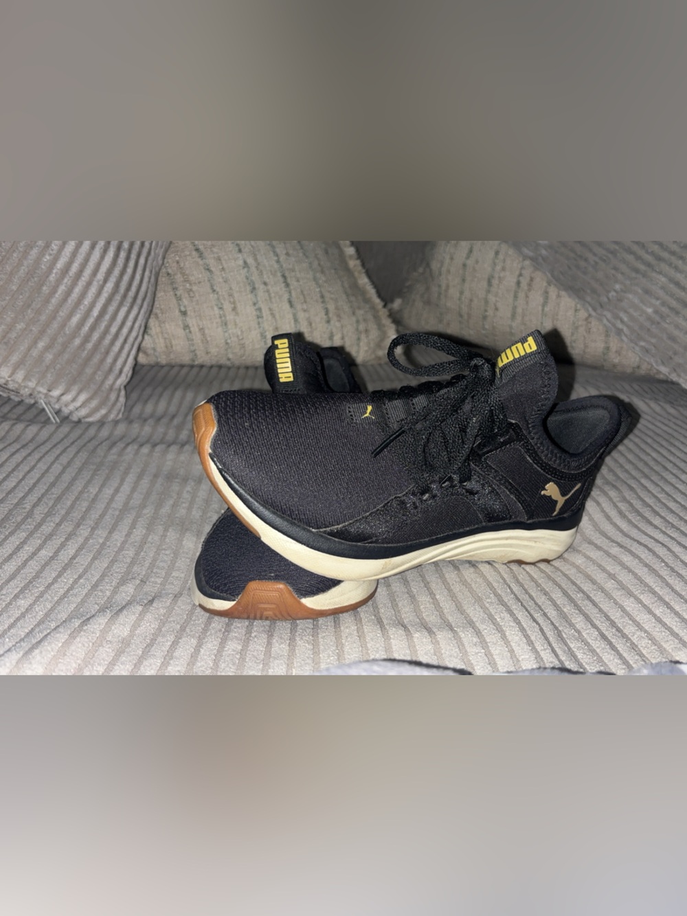 Puma Black Sneakers with Gold Logo